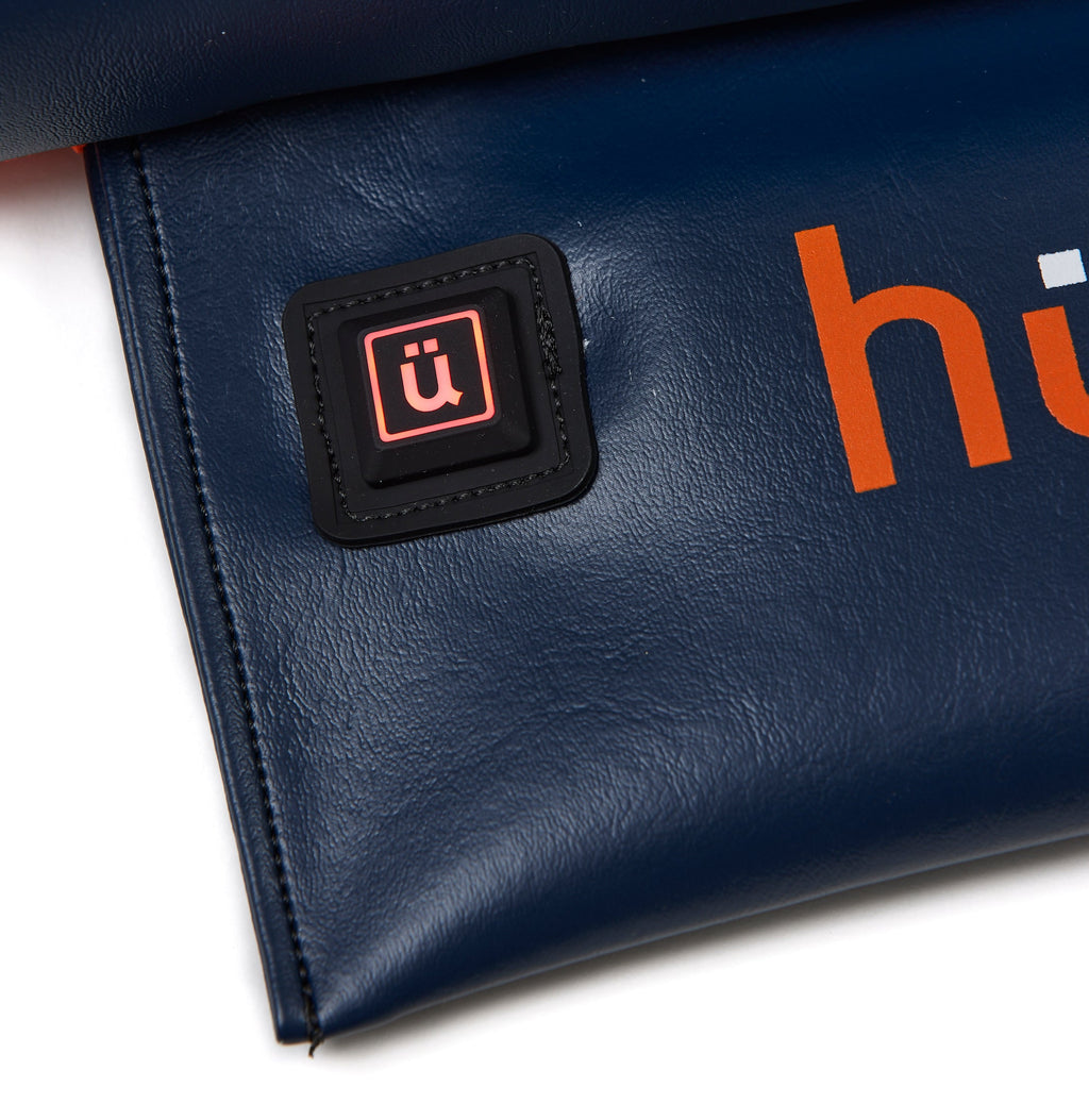 Hüga Heated Cushion – Marine Navy Vinyl / Orange Logo
