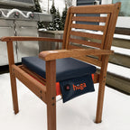 Hüga Heated Cushion – Marine Navy Vinyl / Orange Logo