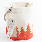Canvas bucket bag with red forest design and 'Sea Bagg' tag on a white background