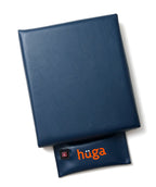 Hüga Heated Cushion – Marine Navy Vinyl / Orange Logo
